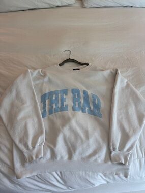 THE BAR Crewneck Sweatshirt - White with Light Blue Logo